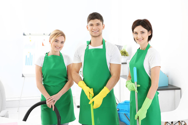 Service team cleaning modern office - Фото, изображение