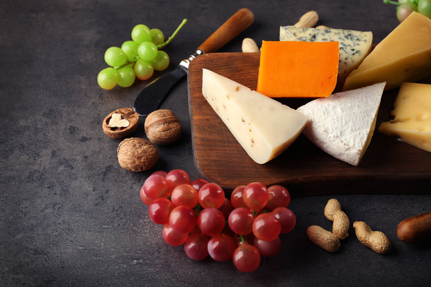 board with variety of cheese - Фото, зображення