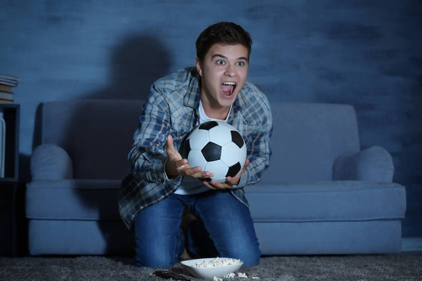 Teenager watching football match  - Foto, imagen