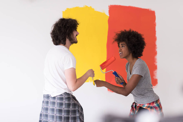 couple painting interior wall - Fotó, kép