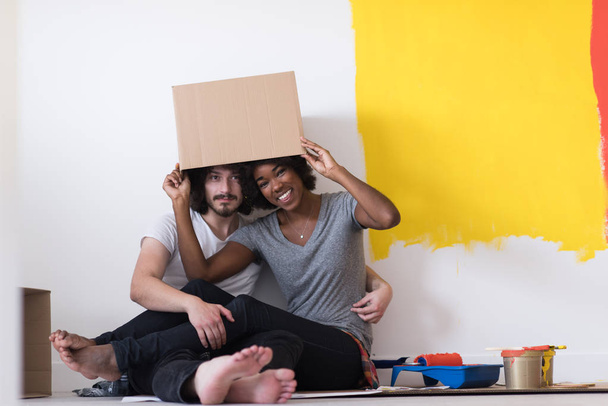couple playing with cardboard boxes - Foto, Imagen