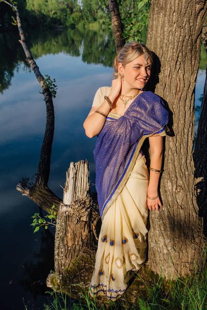 Beautiful european woman in sari - Fotó, kép