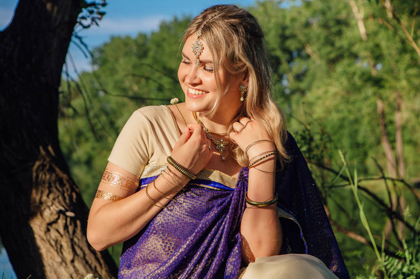 Beautiful european woman in sari - Фото, зображення