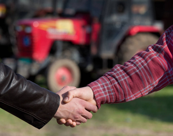 Farmers shaking hands - Photo, Image