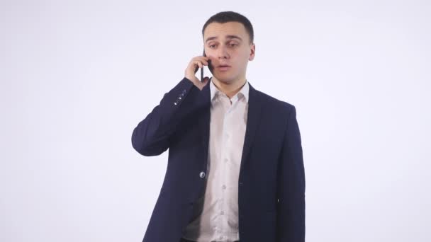 business man screaming on cell mobile phone - Felvétel, videó