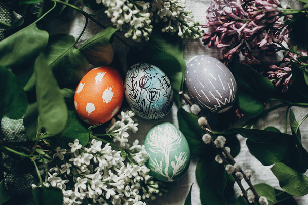 easter eggs with lilac flowers  - Zdjęcie, obraz