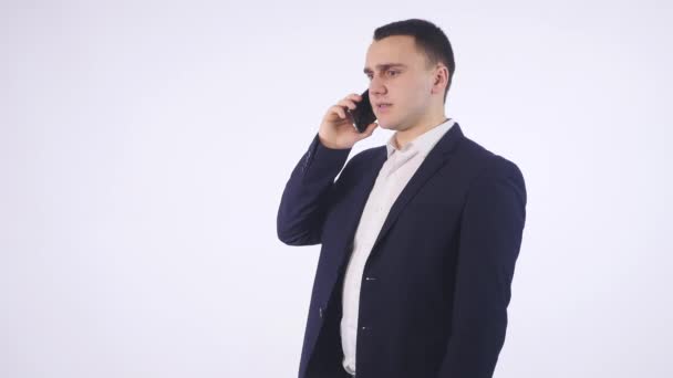 business man screaming on cell mobile phone - Materiał filmowy, wideo