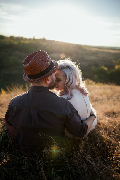 loving couple in countryside - Foto, Imagen