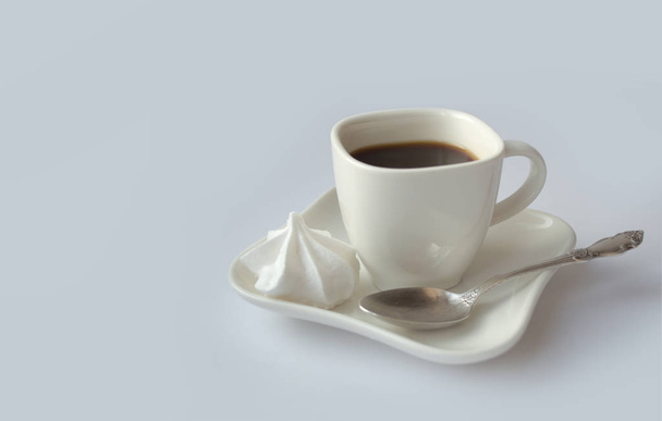White cup for coffee on a plate - Fotó, kép