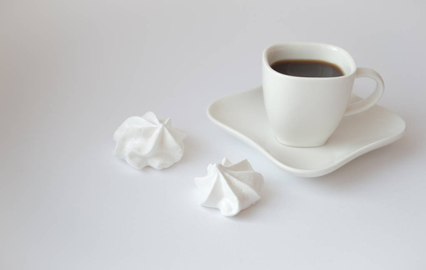 White cup for coffee on a plate - Fotó, kép