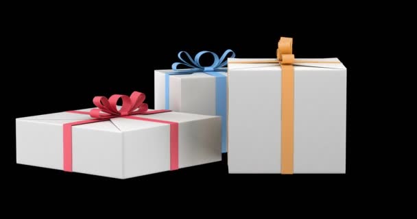 cajas de regalo con cintas de color y lazo de arcos giran sobre fondo negro
 - Imágenes, Vídeo
