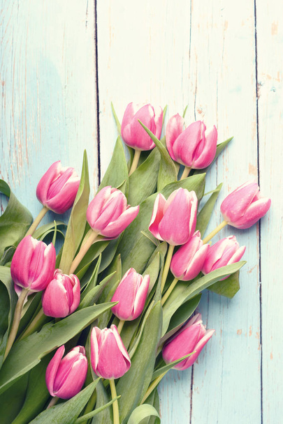 Bouquet of tulips on vintage wooden table - Photo, Image