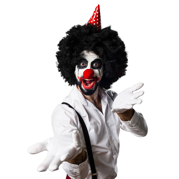 Killer clown presenting something - Zdjęcie, obraz
