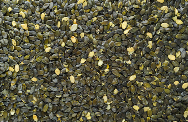 насос насіння розкидані над кам'яною дошкою
 - Фото, зображення