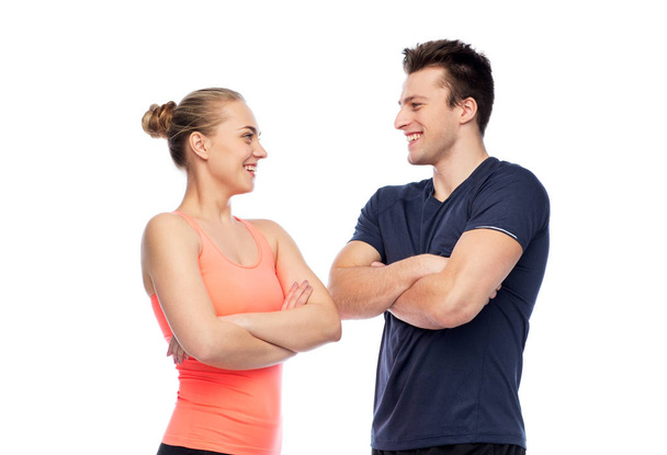 счастливый спортивный мужчина и женщина - Фото, изображение