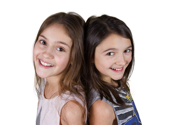 Friendship.Happy smiling two little girls, schoolgirls. - Fotoğraf, Görsel