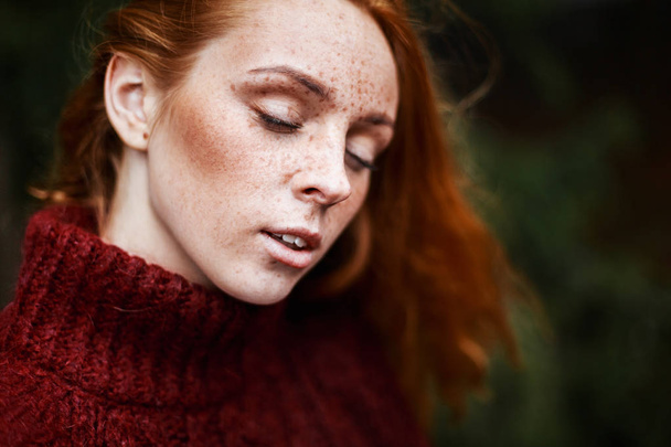 Portrait redhead woman with freckles - 写真・画像