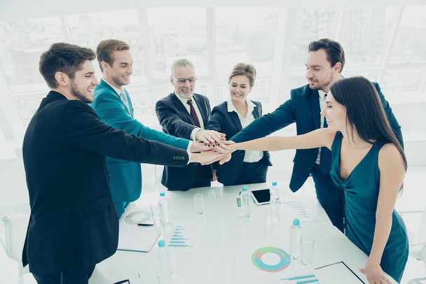 Group of business people joining hands and representing  friends - Photo, Image