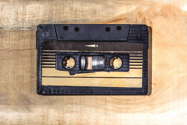 cassette tape recorder on the wooden table - Fotografie, Obrázek