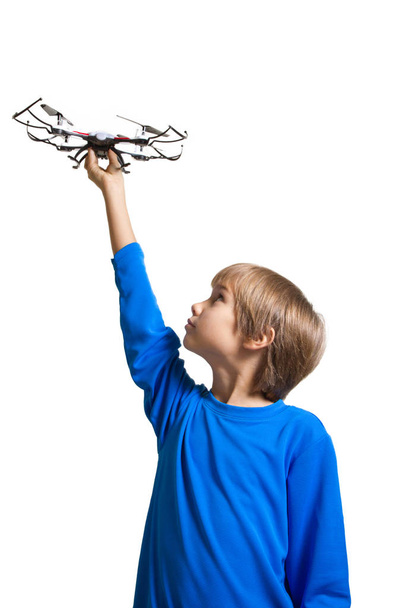 Little kid with drone isolated on white - Foto, imagen