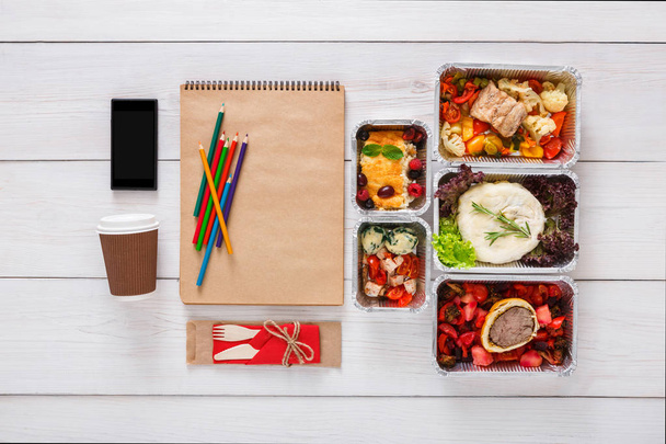 Healthy food, lunch in foil box on student table, diet - Photo, Image