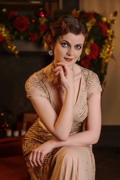 Portrait of young woman in art-deco style - Photo, image