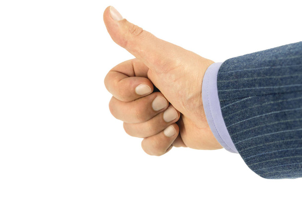 Close-up of male hand in blazer, showing thumb up, isolated on white background - Foto, Imagem