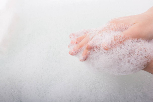 Child washing hands  in foam - Photo, Image