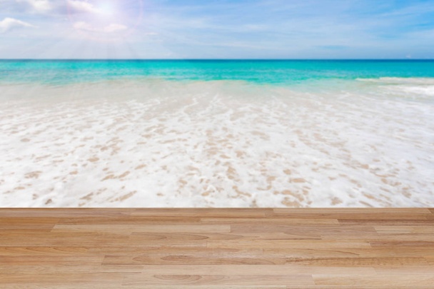 Wood table floor on beach , tropical sea scenery background. - Photo, Image