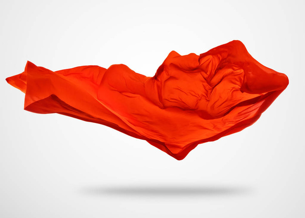 Smooth elegant red cloth on gray background - Foto, afbeelding
