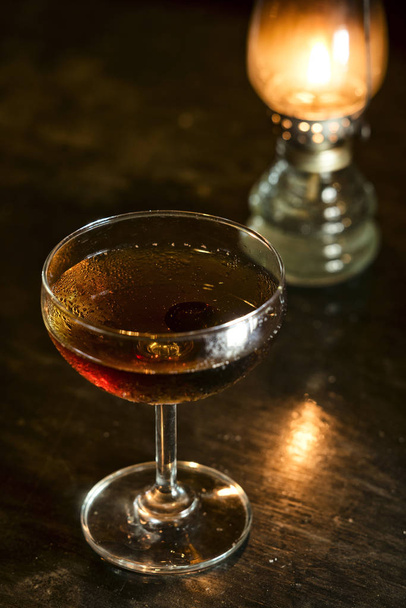 manhattan classic whisky cocktail drink in bar - Fotó, kép