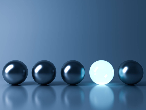 One blue glowing light ball standing out from the metal sphere balls on dark blue background with reflection and shadow , individuality and different creative idea concepts - Photo, Image