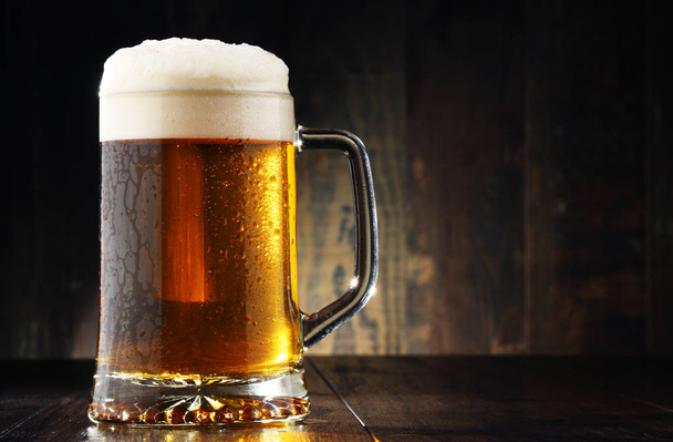 Composition with glass of beer on wooden background - Photo, Image