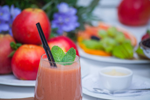 Healthy red smoothie and ingredients - superfoods, detox, diet, health, vegetarian food concept. - Foto, immagini