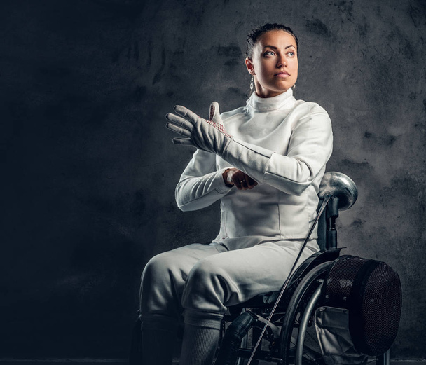 Female fencer in wheelchair  - Photo, Image