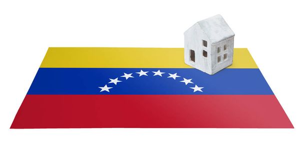Pequeña casa en una bandera - Venezuela
 - Foto, Imagen