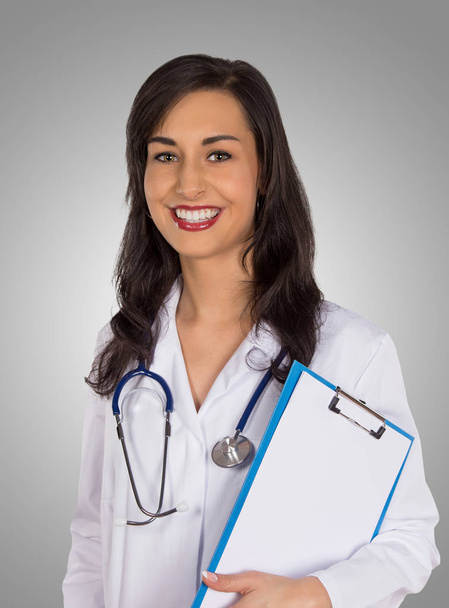 Portrait of attractive young female doctor. - Photo, image