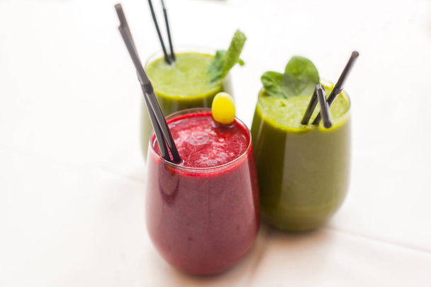 Healthy green and red smoothies - superfoods, detox, diet, health, vegetarian food concept. - Fotografie, Obrázek