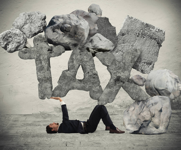 Businessman crushed by the weight - Photo, Image
