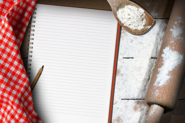 Cuaderno vacío con harina y rodillo
 - Foto, Imagen