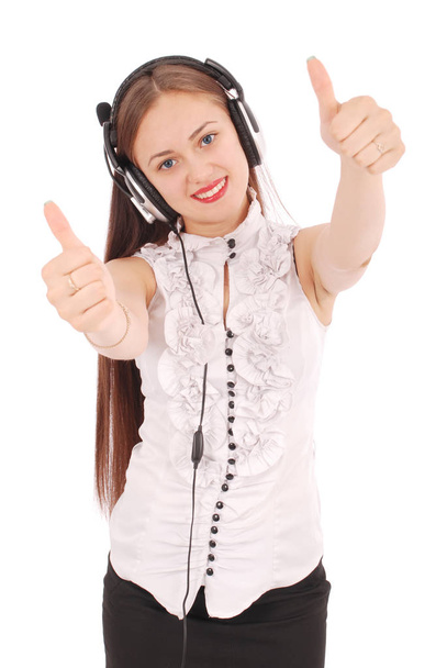 Pretty teenage girl listening music on her headphones  - Foto, afbeelding