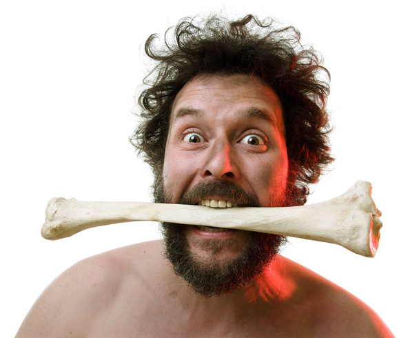 Caveman, manly man with Big Bone, showing of his strength and masculinity: Plus: he needs Meat. - Foto, Imagem