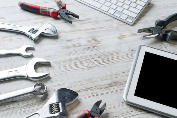 Set of industrial tools and tablet - Foto, imagen