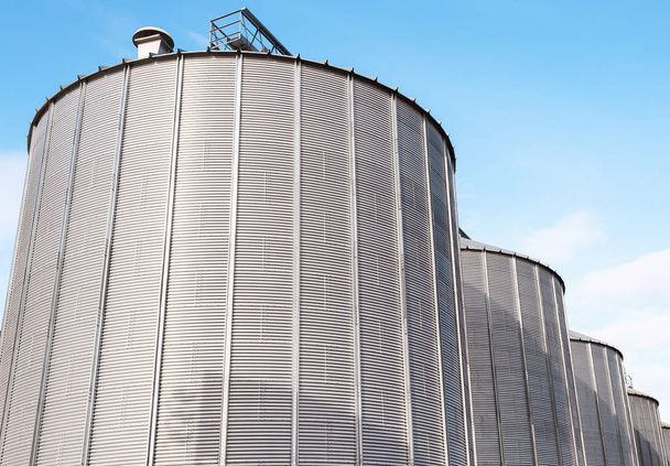 Agricultural silos on blue sky. - Photo, Image