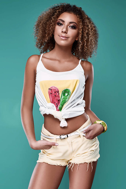 Glamor swag black hipster woman model with curly hair - Fotó, kép