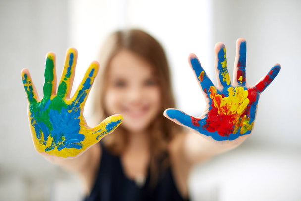 girl showing colored hands - 写真・画像