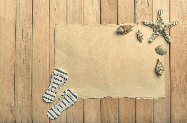 Old paper flip-flops and starfish. - Фото, изображение