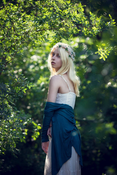 albino girl posing in green park - Photo, Image