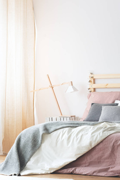 Bed with pastel bedding - Fotografie, Obrázek