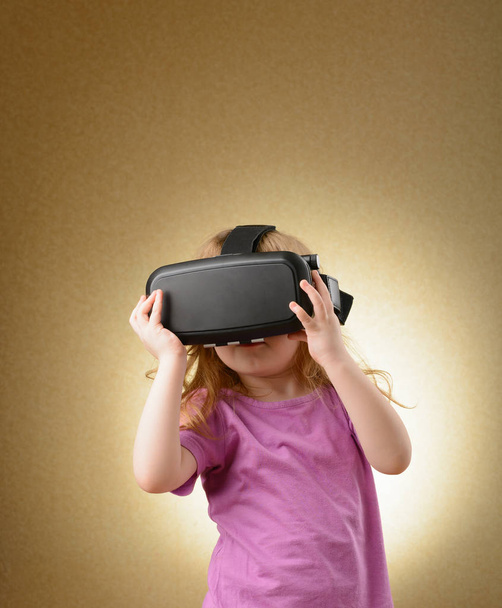 Little girl in virtual goggles - Photo, Image
